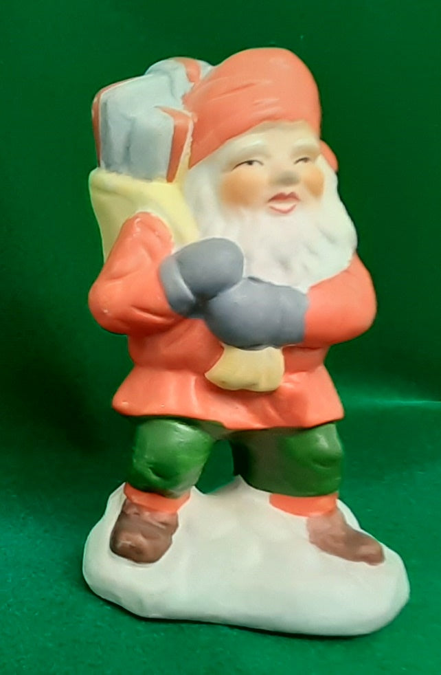 Stor nisse med lygte og lille med gaver