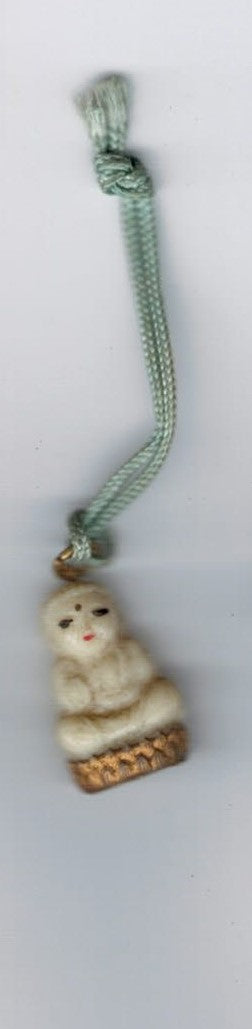 Lille Buddha figur i snor