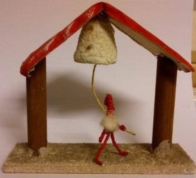 Gammel julepynt nisse som klokker
