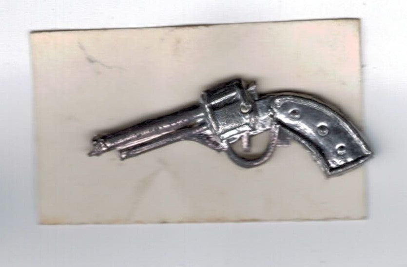 Pins med pistol