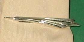 Slipsenål fjerbold