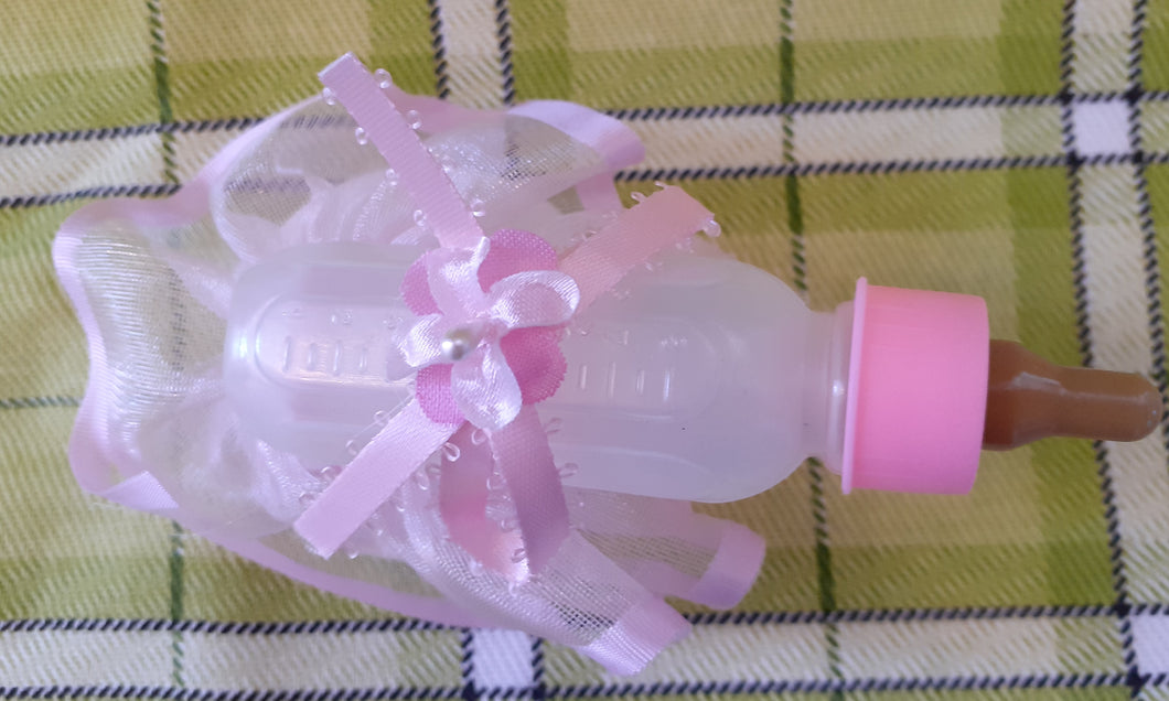 Kagefigur barnedåb sutteflaske lyserød